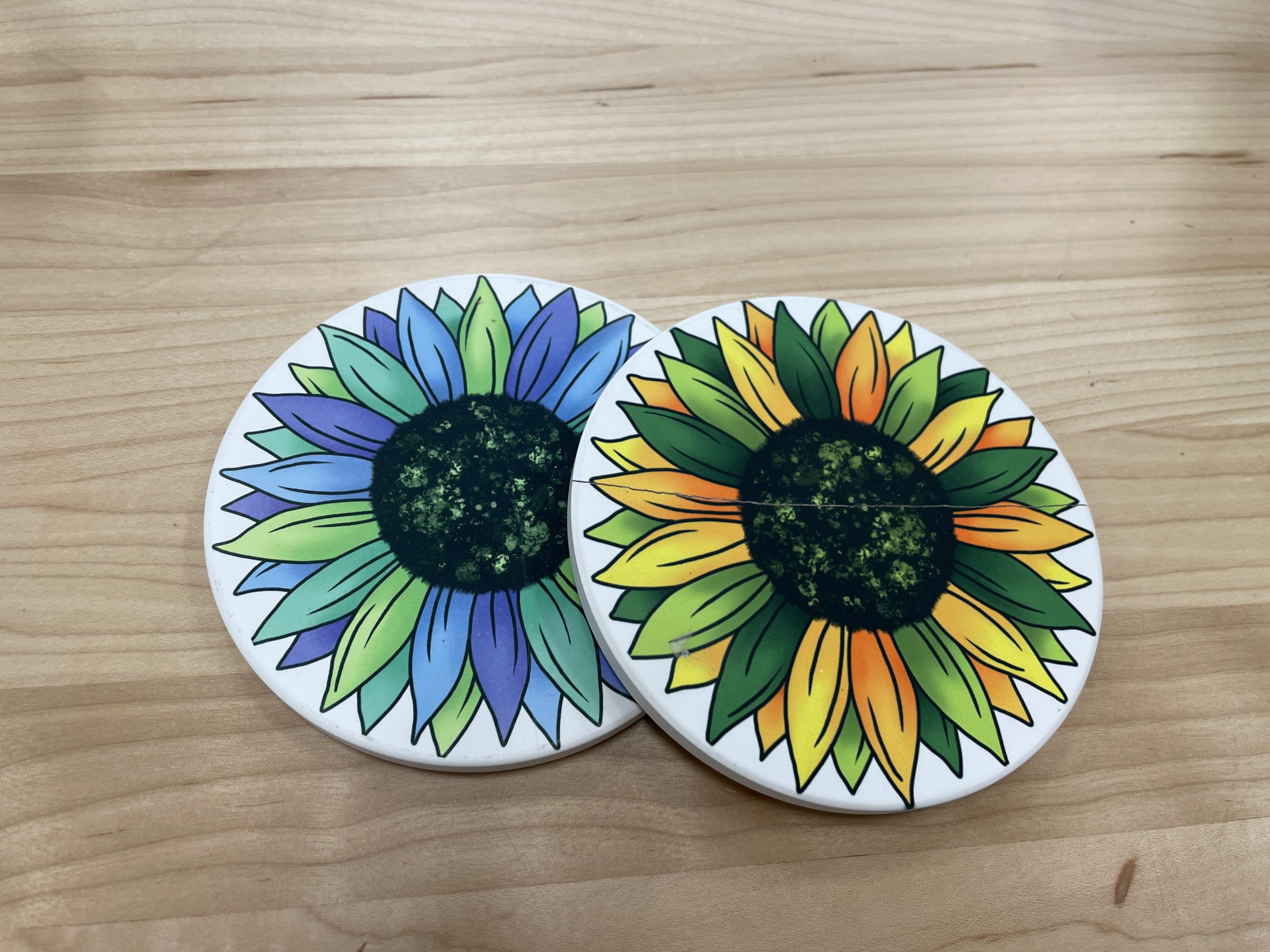 Colorful flower printed on ceramic coasters.